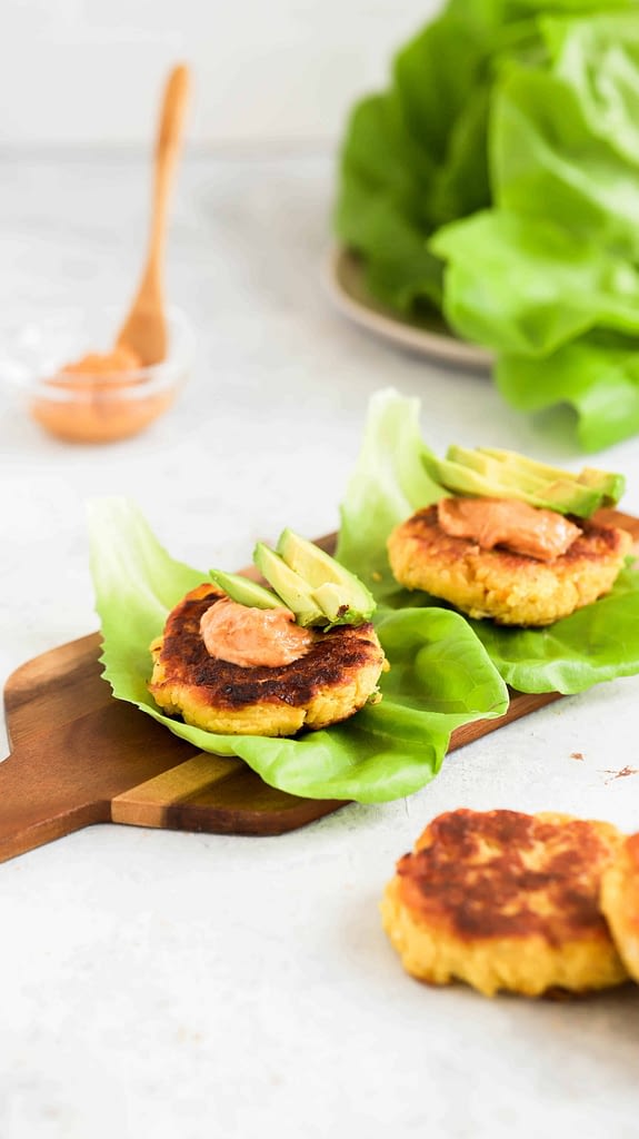 plantain burger on lettuce with aioli and avocado